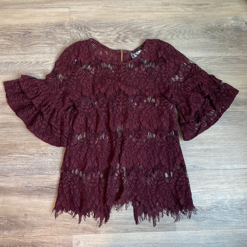Burgundy lace with a zip-up back, top.
